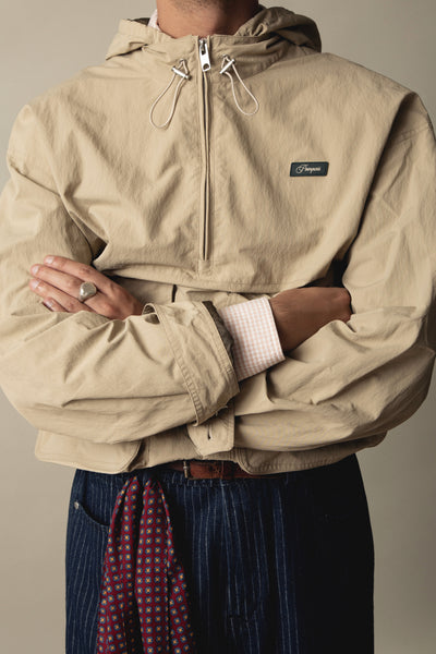 CREAM TECHNICAL WINDBREAKER