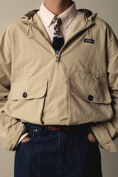 CREAM TECHNICAL WINDBREAKER